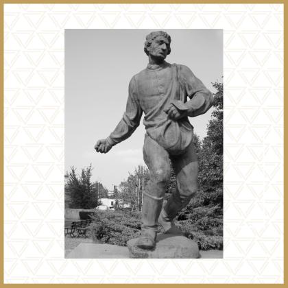 Siewca przed budynkiem Collegium Maximum